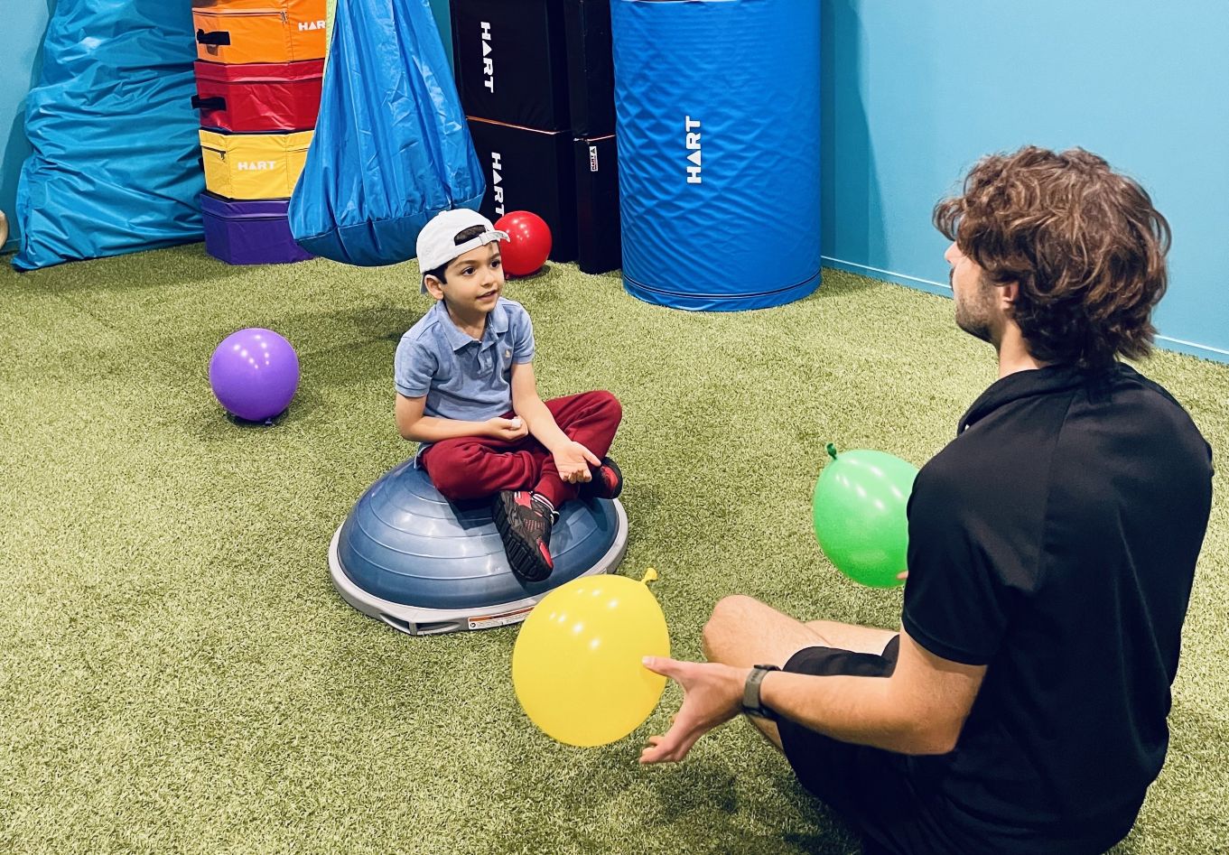 Lewis with NDIS paediatric client